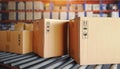 Packaging Boxes Moving on Conveyor Belt. Cartons, Cardboard Boxes. Storehouse. Distribution Warehouse. Shipping Supplies Warehouse Royalty Free Stock Photo
