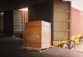 Packaging Boxes Wrapped Plastic Stacked on Pallets Loading into Cargo Container. Distribution Supplies Warehouse. Shipping Trucks.