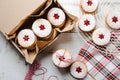 Packaging Linzer Christmas cookies to make a present