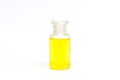 Packaging plastic clear bottle with yellow liquid on white background isolated. Royalty Free Stock Photo