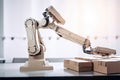 packaging and sorting robot, with hands on its sides, reaching for boxes Royalty Free Stock Photo