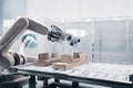 packaging and sorting robot, preparing shipments of consumer goods
