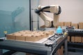 packaging and sorting robot working in factory, preparing products for shipment