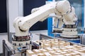 packaging and sorting robots, busy at work in factory, packaging products