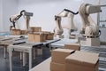 packaging and sorting robots working in mock store, packaging products for purchase