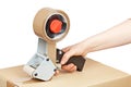 Packaging tape dispenser and shipping box Royalty Free Stock Photo