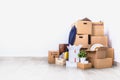 Packed cardboard boxes and stuff during moving into new home Royalty Free Stock Photo