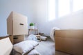 Packed cardboard boxes and stuff during moving into new home Royalty Free Stock Photo