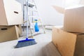 Packed cardboard boxes and stuff during moving into new home Royalty Free Stock Photo