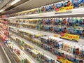 Packed chicken nugget in various brand placed in display chiller refrigerator inside the huge supermarket.