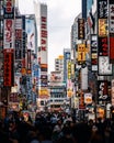 Packed downtown city in tokyo japan filled with many signs