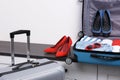 Packed modern suitcases for vacation, indoors