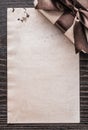 Packed present box paper on vintage wooden board vertical versio Royalty Free Stock Photo