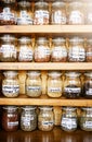 Packed and ready to enjoy. jars of various teas packed on shelves. Royalty Free Stock Photo