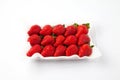 packed strawberries fruits isolated on white background Royalty Free Stock Photo