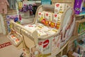 Packets of Huggies baby diapers displayed in a supermarket. Minsk, Belarus - March 2021