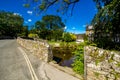 Packhorse bridge over the Malham Beck, Malham, Yorkshire Dales, North Yorkshire, England, UK Royalty Free Stock Photo