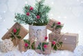 Packing Christmas gifts. Craft gift boxes and decorations