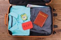 Packing luggage for vacation. Royalty Free Stock Photo