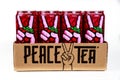 Packing of Peace tea cans with natural flavor from the Coca-Cola company.