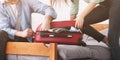 Packing suitcase. Couple trying to close valise Royalty Free Stock Photo