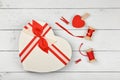 Packing Valentine heart shaped gift box on table Royalty Free Stock Photo