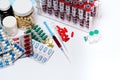 Packings of pills and capsules of medicines and blood test tubes Royalty Free Stock Photo