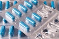 Packs of blue pills. Opened package, missing tablets. Use of drugs. Soft focus Royalty Free Stock Photo