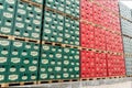 Packs of bottled beer in an outdoor storage lot