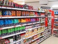 Packs of coffee on a store shelf.