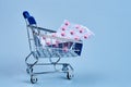 packs of pills in a trolley shopping in a pharmacy medicines