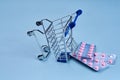 packs of pills in a trolley shopping in a pharmacy medicines