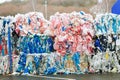 Packs and Stocks of Wrapped Scrap Plastic Dedicated for Eco Recycling in front of a Recycling Factory Royalty Free Stock Photo