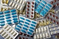 packs of tablets and pills in white yellow blue and brown color Royalty Free Stock Photo