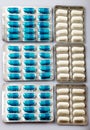 Packs of tablets and pills in white yellow blue and brown color Royalty Free Stock Photo