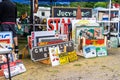 Vendor Booth Displays Vintage Signs at Annual Community Flea Market
