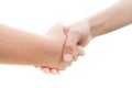 Pact between a youth and an adult with a handshake Royalty Free Stock Photo