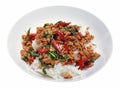 Pad Kaphrao is Stirred and fried pork with holy basil and chilies served on steamed rice. Royalty Free Stock Photo