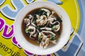 Pad kaprao with squid, favourite spicy food with basil. Pad kaprao is a famous food from Thailand. Royalty Free Stock Photo