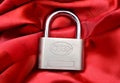 Pad Lock on Red Silk Cloth close up