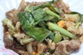 Pad se-ew moo, stir fried flat noodle and pork Royalty Free Stock Photo