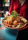 Pad Thai: An artful overhead shot of a plate of Pad Thai noodles, capturing the dish& x27;s intricate ingredients and