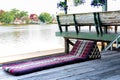 A pad in Thai Lanna style in Northern culture of Thailand, the cushion in front of traditional Thai home terrace, pad for seat or