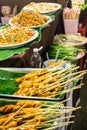 Pad Thai noodles and Sausage on banana leaf ready to eat on in street market