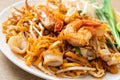 Pad Thai Seafood - Stir fried noodles with shrimps, squid or octopus and tofu Royalty Free Stock Photo