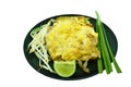 Pad Thai stir fried rice noodles with dry shrimp wrapped with egg on plate Royalty Free Stock Photo
