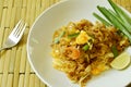 Pad Thai stir fried rice noodles with egg and yellow tofu on plate Royalty Free Stock Photo