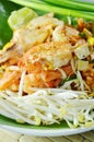 Pad Thai stir fried rice noodles with seafood and egg on plate Royalty Free Stock Photo