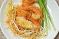 Pad Thai stir fried rice noodles with shrimp and egg on plate Royalty Free Stock Photo