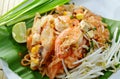 Pad Thai stir fried rice noodles with shrimp and squid on plate Royalty Free Stock Photo